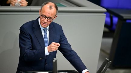 Friedrich Merz le probable futur chancelier allemand, lors d'un débat au Bundestag, à Berlin le 13 mars 2025. (TOBIAS SCHWARZ / AFP)